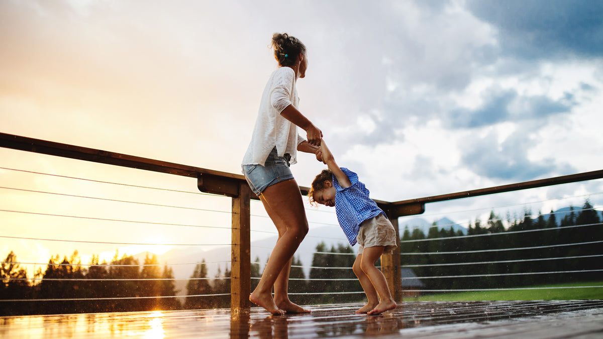 http://adarose.com/cdn/shop/articles/mother-with-small-daughter-playing-in-rain-on-pati-2022-02-01-22-38-13-utc.jpg?v=1675741393